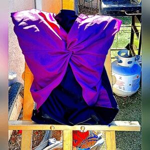 XL one-piece swimsuit made out of spandex , the color is black and pink